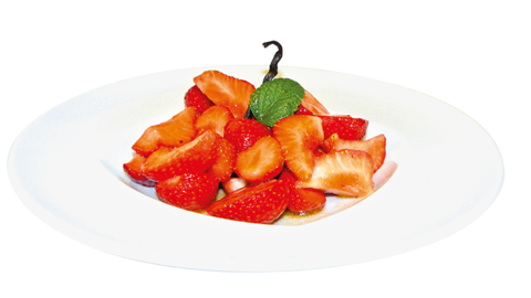 Foto von Erdbeeren auf einem Teller serviert mir Vanille-Olivenöl 