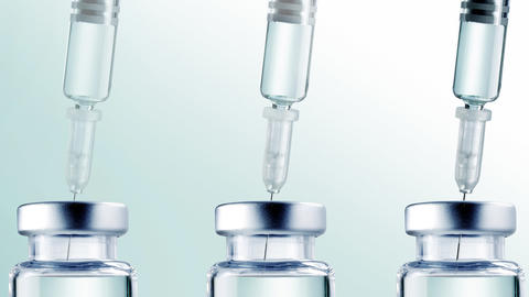 Bild von drei aufgezogenen Spritzen